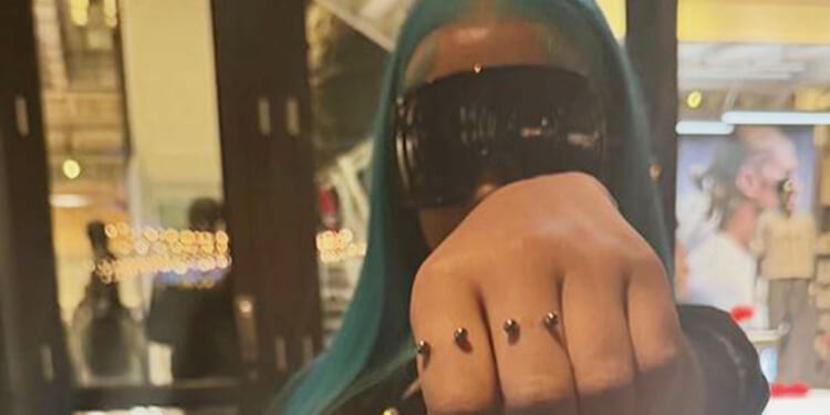 North West, 12, gives shocking close-up look at finger piercings and teases new music