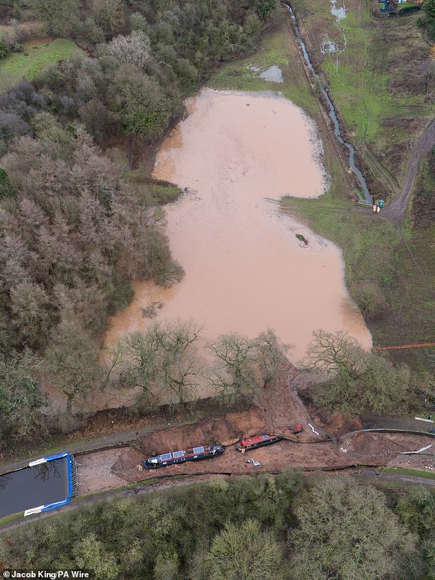 Two boats remain stranded at the bottom of the breach, ahead of an operation to winch them clear due to begin later this week