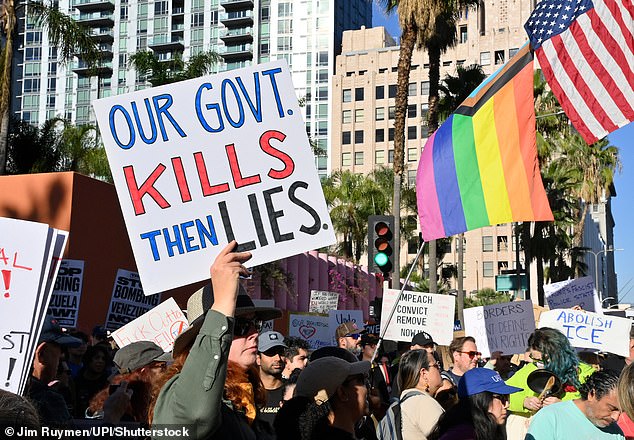 Activists protest the shooting death of Renee Good in Minneapolis at Pershing Square in Los Angeles on Saturday