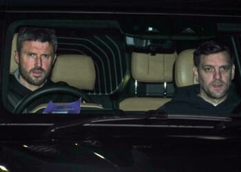 Michael Carrick gives Jonathan Woodgate a lift to training as he prepares for Man Utd baptism of fire against City