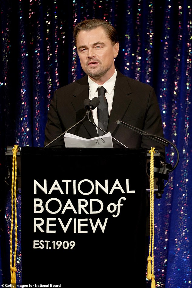 The American actor, 51, who won the award for his starring role in One Battle After Another, expressed his gratitude to his mother, 82, for always supporting 'the dream' while accepting his award on stage