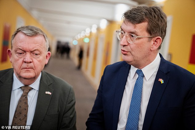 Denmark's defence minister Troels Lund Poulsen (R) said Wednesday that Copenhagen would 'strengthen' its military footprint on the island and was in dialogue with allies in NATO