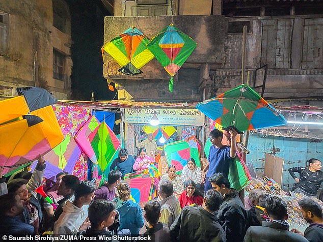 A large number of people crowded patang (kite) markets on the eve of the two-day kite-flying festival in Ahmedabad's Old City