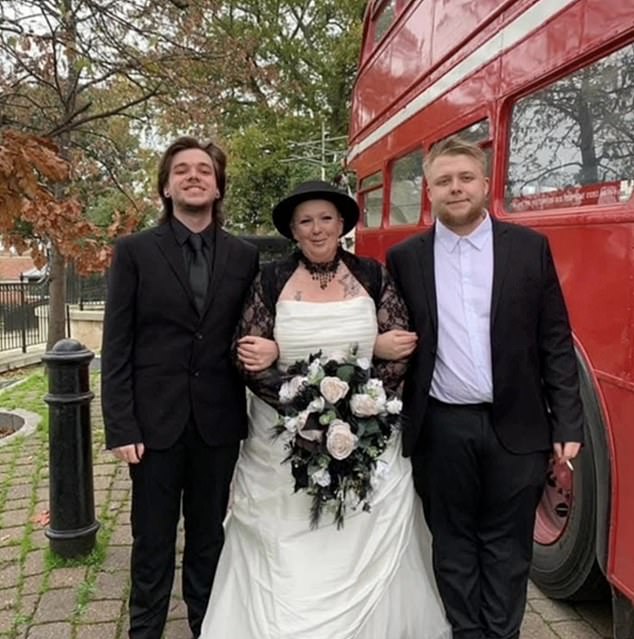 The family recalled how they first noticed signs something was wrong with Andre at a 2022 wedding (pictured: Sam, middle, with sons Tyler, left, and Andre, right)