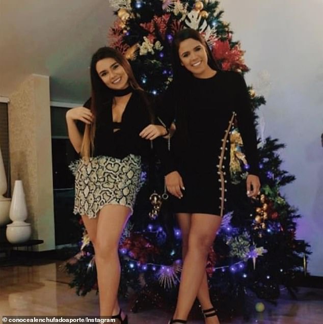 Yarazetd (left) strikes a post with her friend Julikar Navas, whose father is also a general