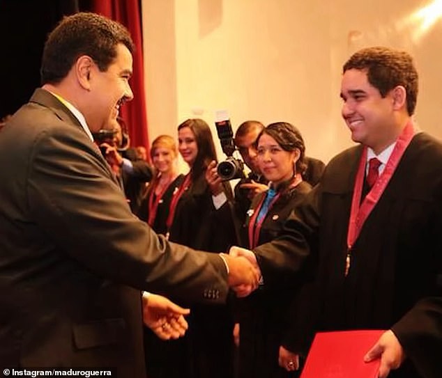 Nicolasito is seen receiving his economics diploma from his father in July 2015. The qualification from the Universidad Nacional Experimental Politecnica de la Fuerza Armada Nacional (UNEFA) in July 2015, is roundly considered a 'joke'