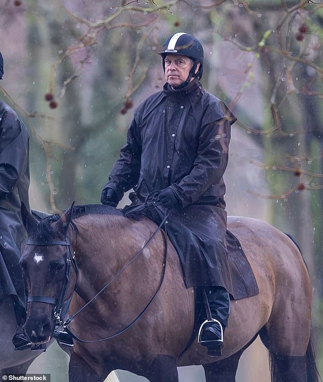 Andrew Mountbatten-Windsor rides in the pouring rain on the Windsor Estate on Tuesday morning