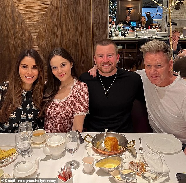 The celebrity chef (right) referred to himself as 'dad' in a comment on Adam's wedding video where the Olympian said he would 'always choose' his new wife Holly