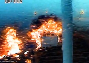 Terrifying moment oil tanker explodes after crashing directly into container ship off UK coast as huge flames erupt
