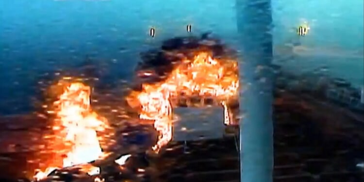 Terrifying moment oil tanker explodes after crashing directly into container ship off UK coast as huge flames erupt