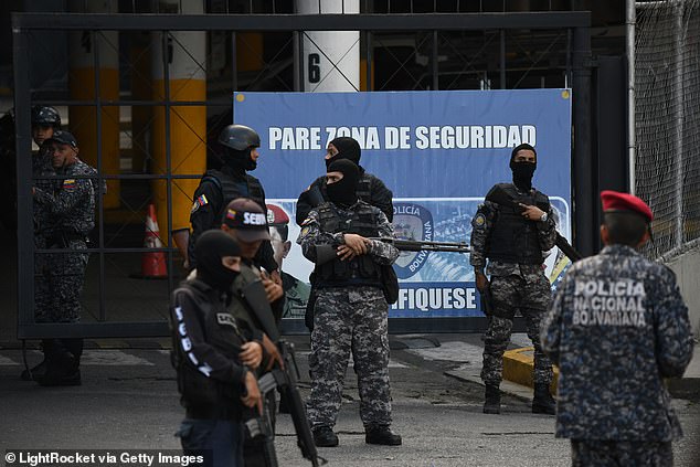 SEBIN officials outside Helicoide prison during riots in 2018
