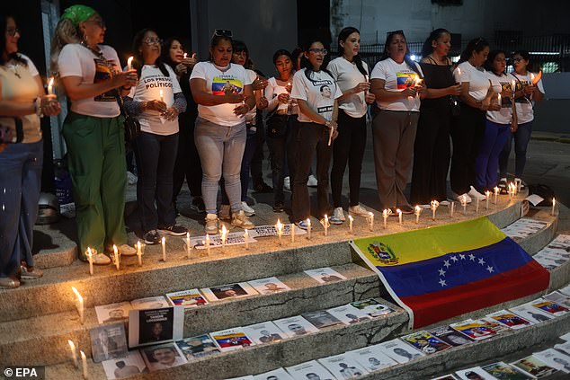 A group of people hold a vigil at El Helicoide in Caracas, Venezuela, January 13 2026