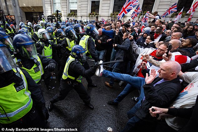 At least 26 police officers were injured with kicks and punches and 24 arrests were made on the day as violence broke out on the streets of the capital, the Metropolitan Police said
