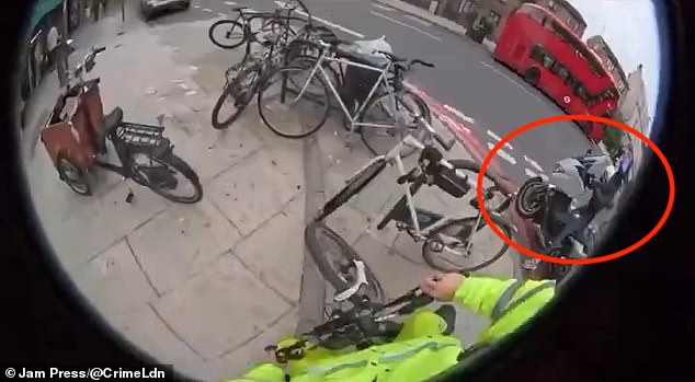 In a bid to throw off the chasing bikes, the cyclist pulled onto the pavement, but the two thieves tried to block his path