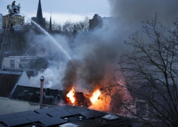 Huge blast destroys several buildings and leaves fire raging as four injured & fears of more buried under rubble