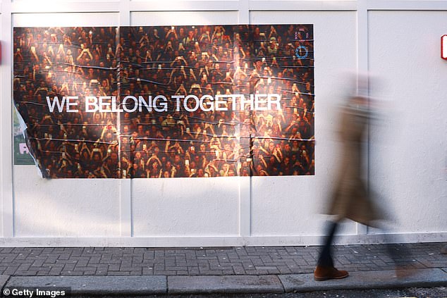 Following this, posters bearing the phrase we belong together and related lines like see you very soon, it¿s all waiting there, here we go again, and let the light in started showing up in major global cities on January 12 (pictured London)