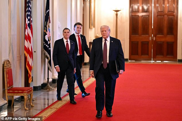 President Donald Trump is seen walking into the East Room for an event with the Florida Panthers. He didn't invite press into his meeting with Maria Corina Machado, where she said she presented him with her Nobel Peace Prize