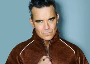 Robbie Williams surprises fans by dropping new Britpop album as he eyes up making chart history
