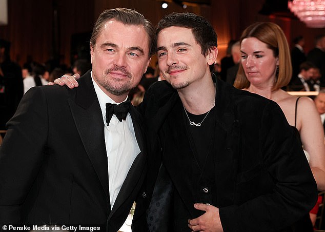 The rivals hugged and chatted during a commercial break at the star-studded event following Chalamet's big win