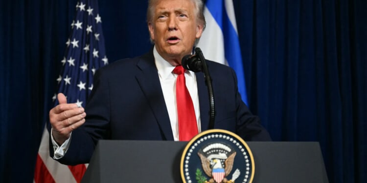 Trump diverts aircraft carrier to Iran after accusations he 'swallowed' rogue nation's lies over executing protesters