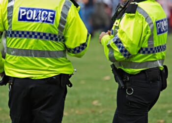 Woman sexually assaulted by two balaclava-clad men down alleyway as cops launch urgent probe