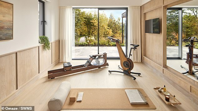 The house also includes a gym, utility and boot room, electric car charger, solar panels and garages