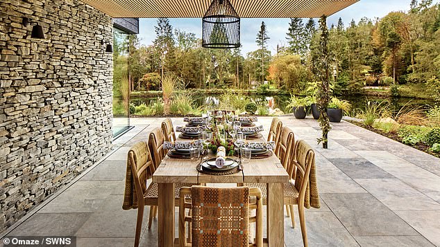 French doors open onto a covered patio area, ideal for when the couple are entertaining and dining al fresco