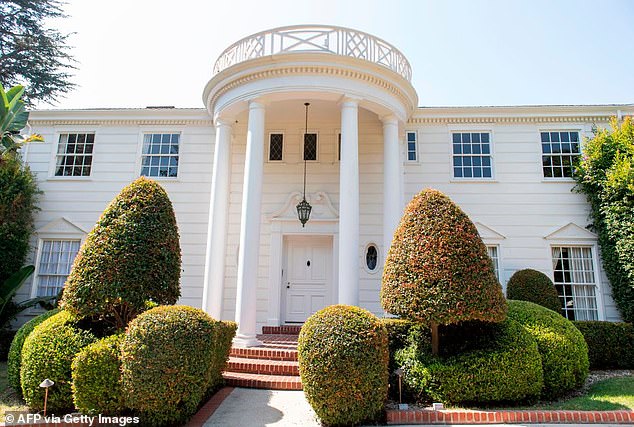 Among the notable features of the white home include four massive columns and symmetrical aesthetics