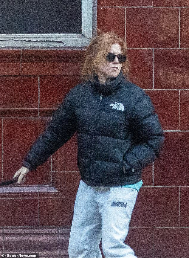 The Now You See Me star kept warm in the chilly London weather in a black padded The North Face jacket