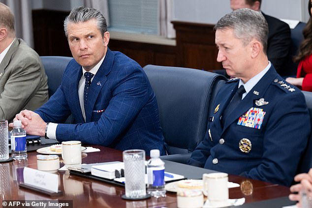 US Defense Secretary Pete Hegseth speaks alongside Chairman of the Joint Chiefs of Staff General Dan 'Raizin' Caine
