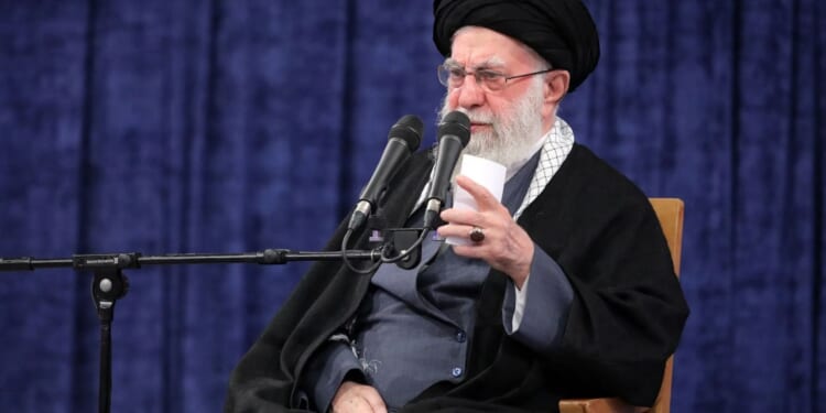 Twisted Ayatollah calls Trump a 'criminal' as he accuses the US of being responsible for the deaths of 3,000 Iranians