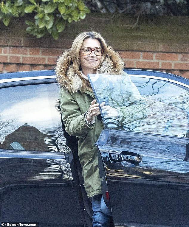 Cat styled her hair straight and showed off her flawless complexion as she hopped out of her car to run some errands