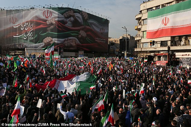Pro-government demonstrators rally at Enghelab (Revolution) Square in central Tehran in support of the Islamic Republic