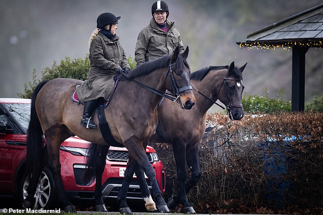 This afternoon he was out and about with his groom near Windsor Castle in Berkshire