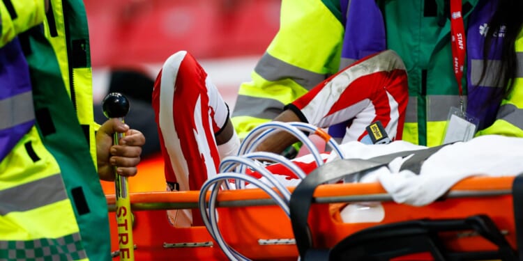 Man City wonderkid, 21, carried off on stretcher after horror injury as opponent comes over to apologise