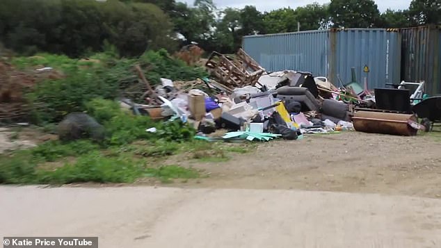 Mounds of rubbish is piled up outside the property in a video that was posted onto Katie's YouTube channel in 2019