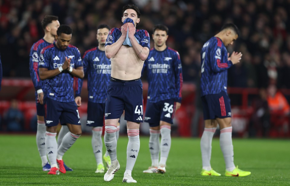 Declan Rice of Arsenal shows dejection with his shirt pulled over his face after a game.
