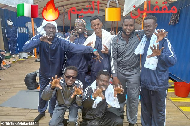Abubaker (front row, left) is pictured on a rescue ship that the Mail has ascertained likely pulled him and another 262 migrants from the Mediterranean