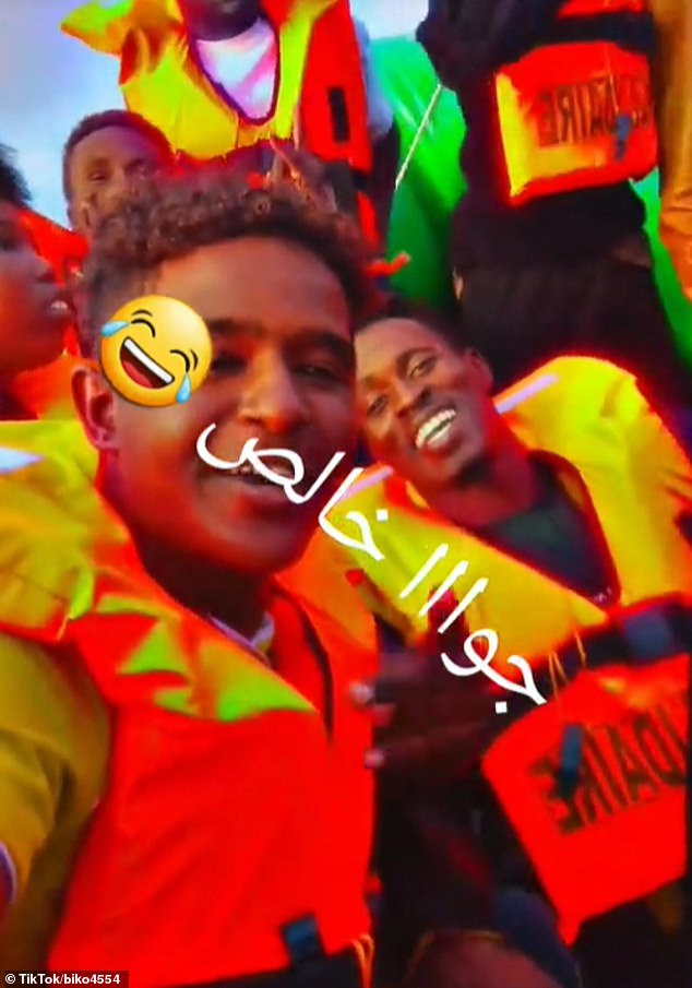 He and other migrants are seen in life-jackets bearing the Solidaire's name in another TikTok