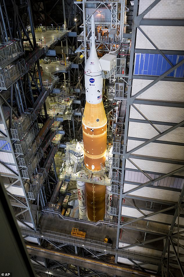 Pictured: The Orion spacecraft sits atop the Artemis II rocket. The spacecraft will carry the astronauts to the moon and back