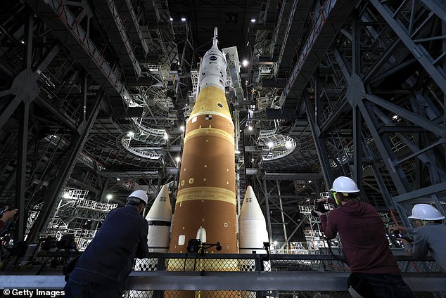 Pictured: The Artemis II rocket sits in the Vehicle Assembly Building prior to its move