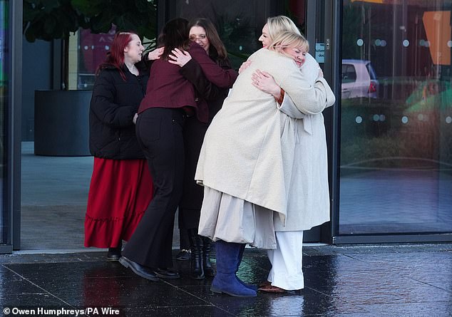The group of nurses hug as they leave the press conference at the Crowne Plaza Hotel, Newcastle, on Friday