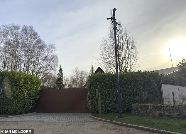 Fyfield Wick, near Kingston Bagpipe in Oxfordshire, where Ellison owns several properties screened by trees and fencing