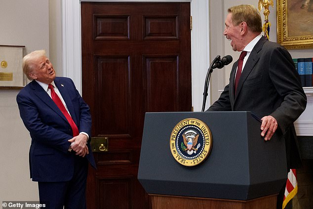 Ellison and US President Donald Trump share a laugh as Ellison speaks during a news conference in the Roosevelt Room of the White House on January 21, 2025