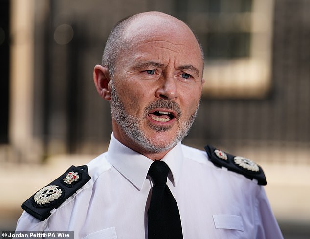 Chair of the National Police Chiefs' Council, Gavin Stephens, speaks to the media outside 10 Downing Street, London