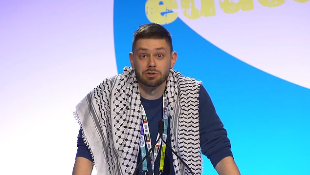 Pictured: an NEU conference delegate wearing a Palestinian keffiyeh