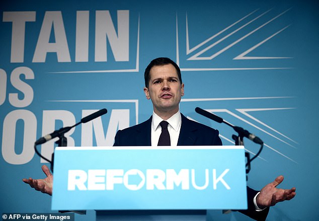 Britain's former Conservative Party Shadow Justice Secretary Robert Jenrick speaks, during a press conference to announce his defection to Reform UK