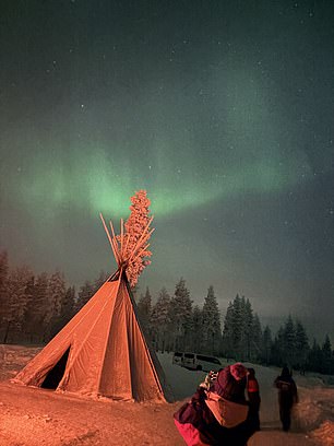 The Northern Lights ripple and dance across the sky, twisting and twirling in a way that feels almost unreal