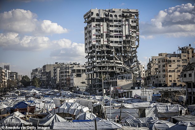 The BOP was announced as the second phase of Trump's plan to rebuild Gaza. Pictured above is destruction in the city on Thursday