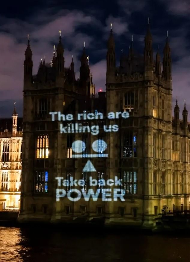 Take Back Power officially launched itself by projecting messages onto the Houses of Parliament